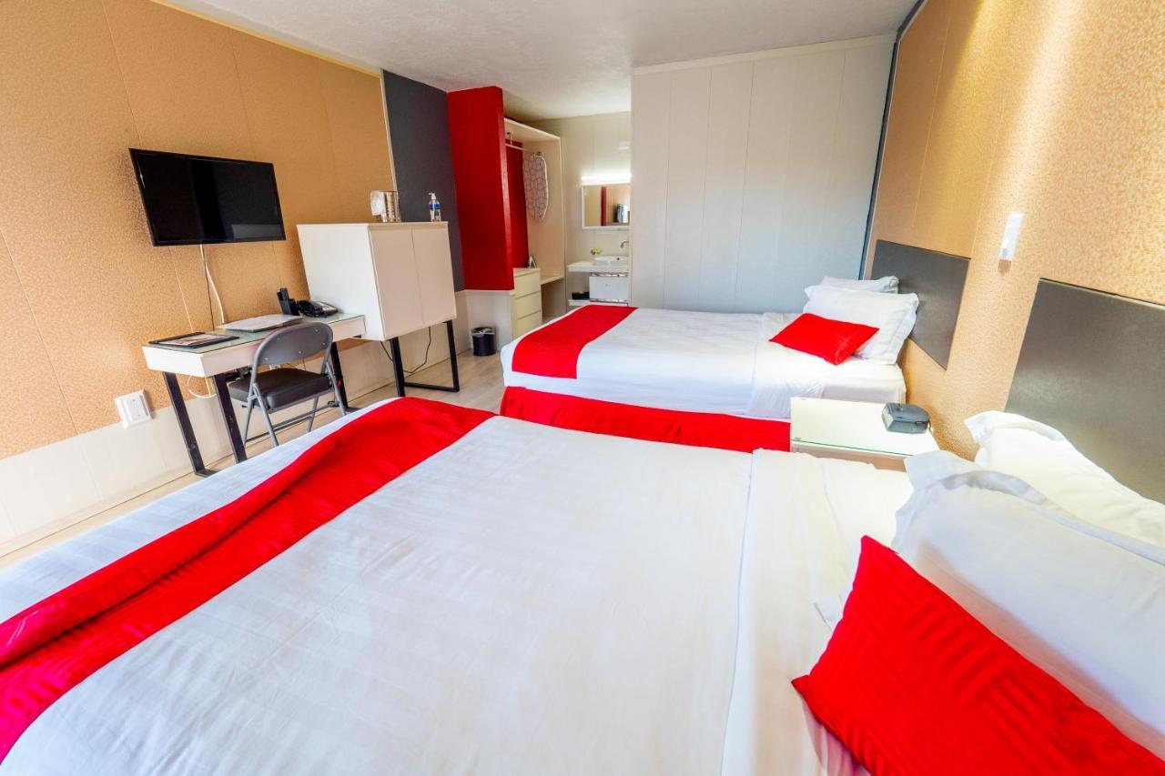 Chambre Double avec 2 Lits Doubles - Non-Fumeurs