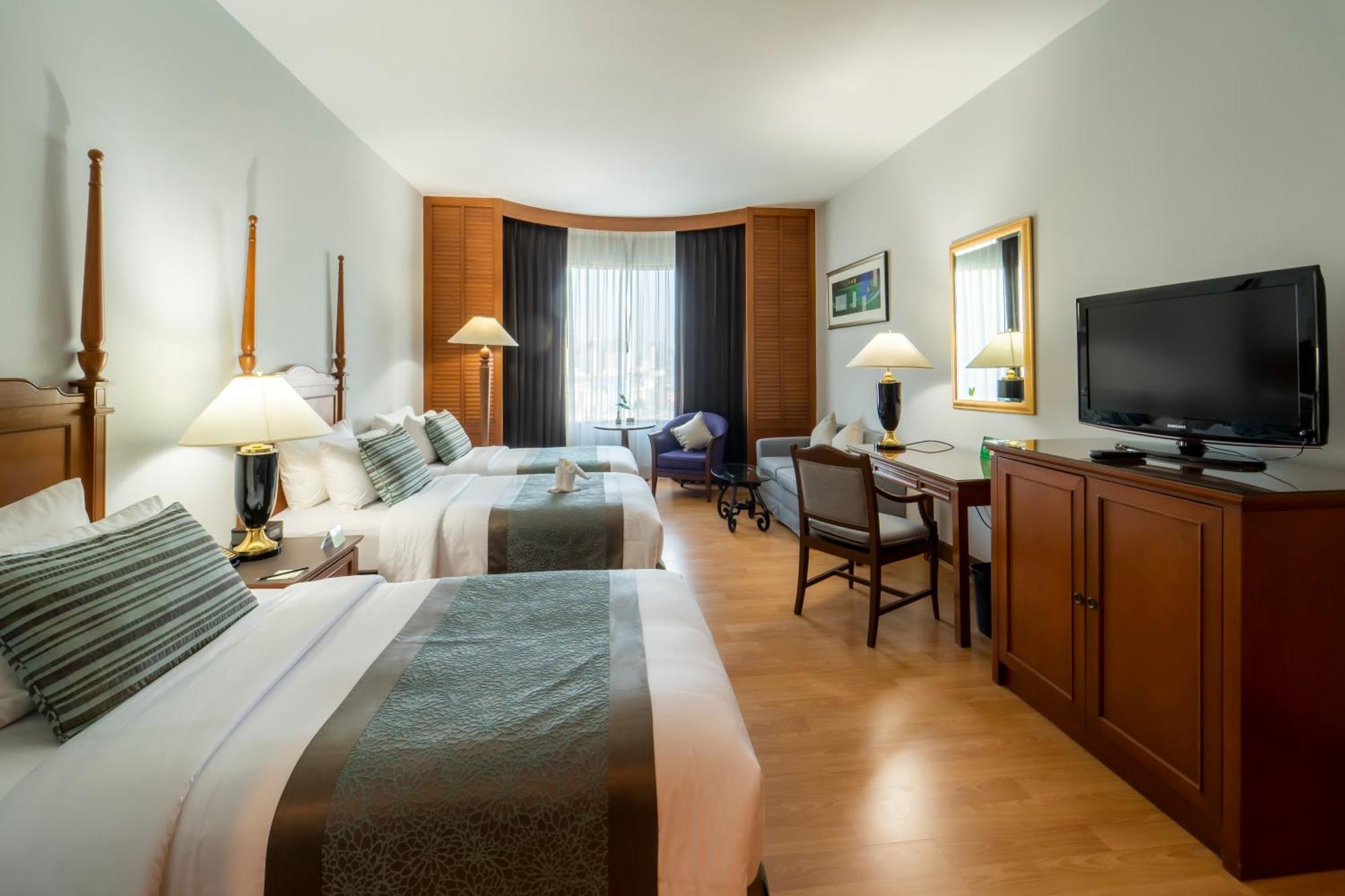 Grand Deluxe Dreibettzimmer
