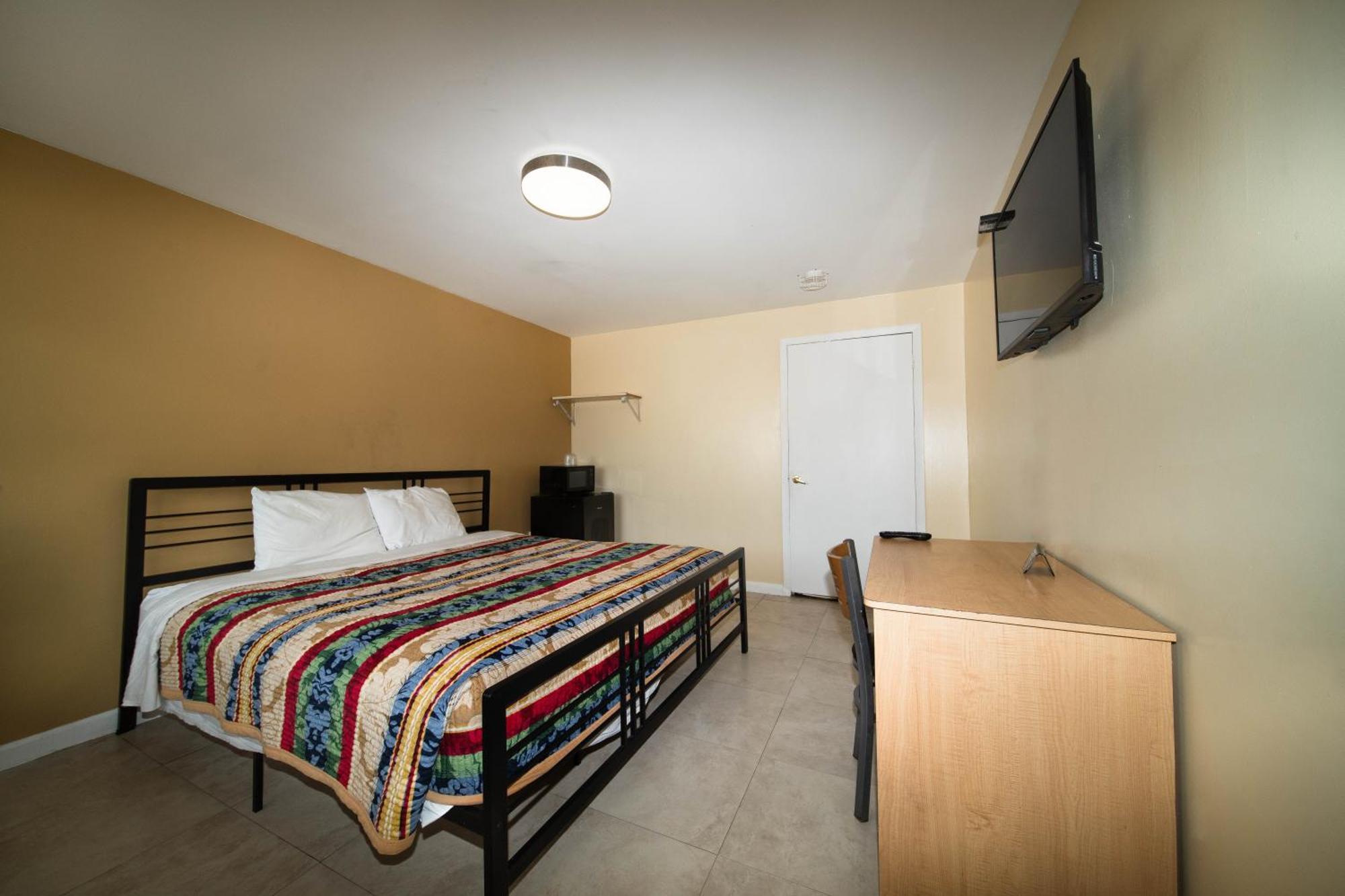 Chambre Lit King-Size - Accessible aux Personnes à Mobilité Réduite