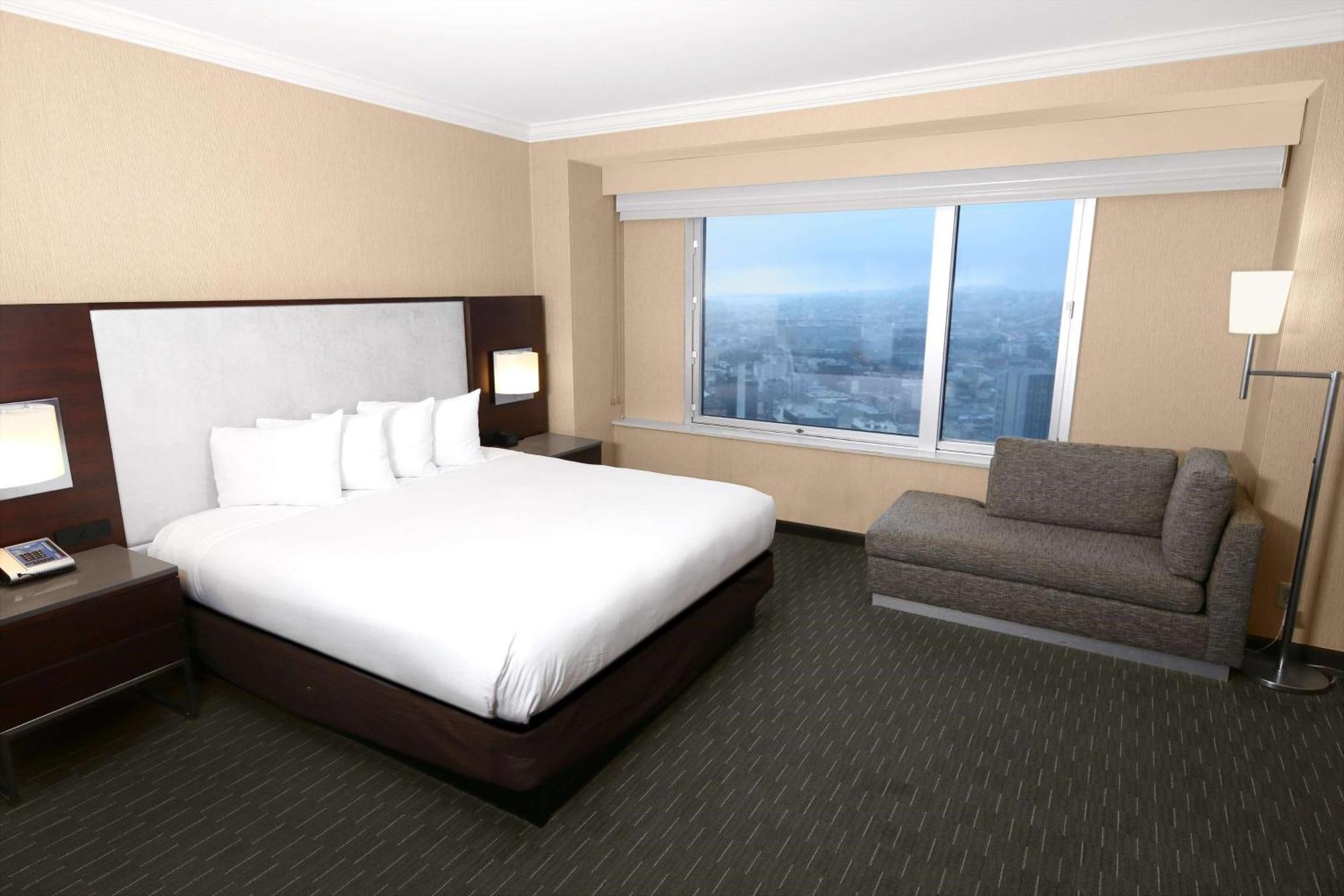 Vistas al horizonte urbano - Suite con 1 dormitorio y 1 cama extragrande